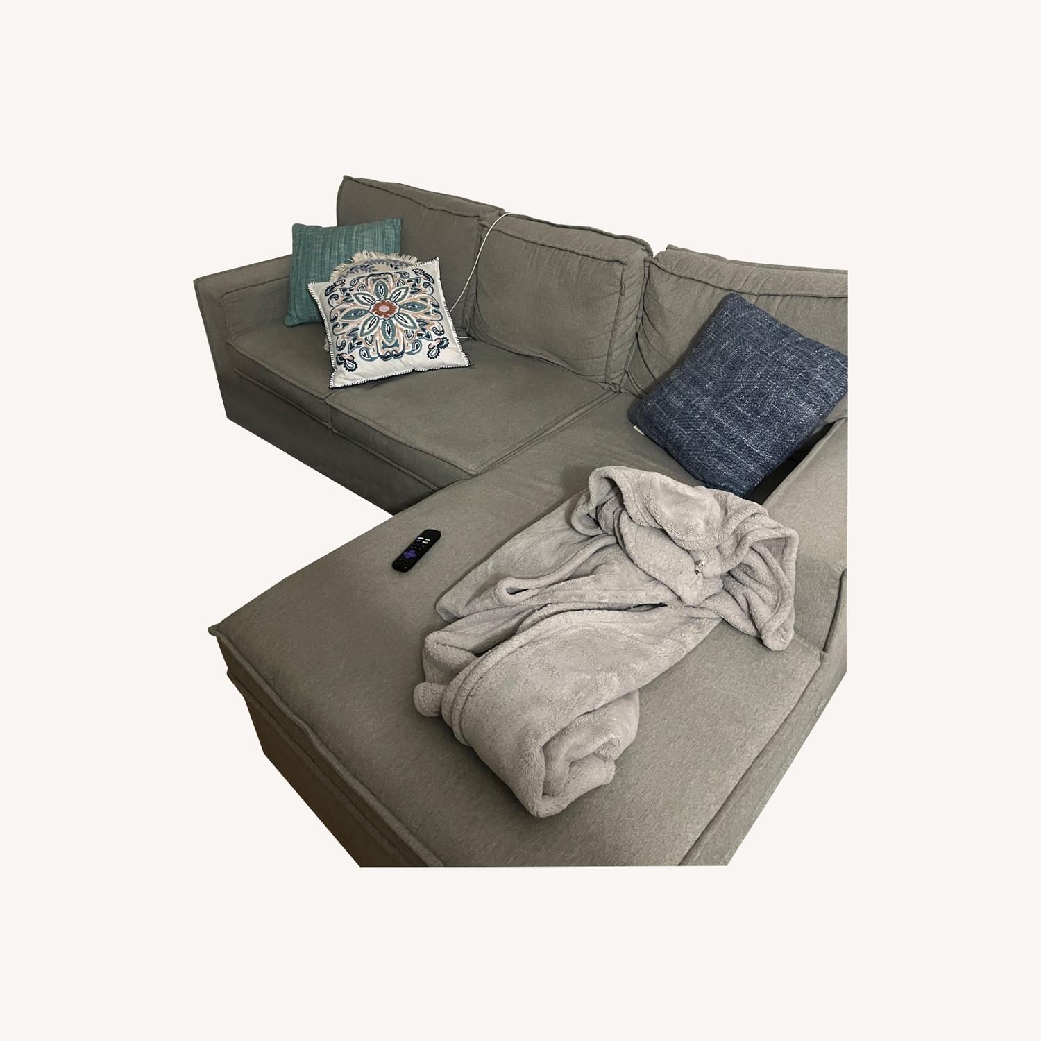 Bob's Discount Furniture Grey Couch That Converts to Bed - image-0