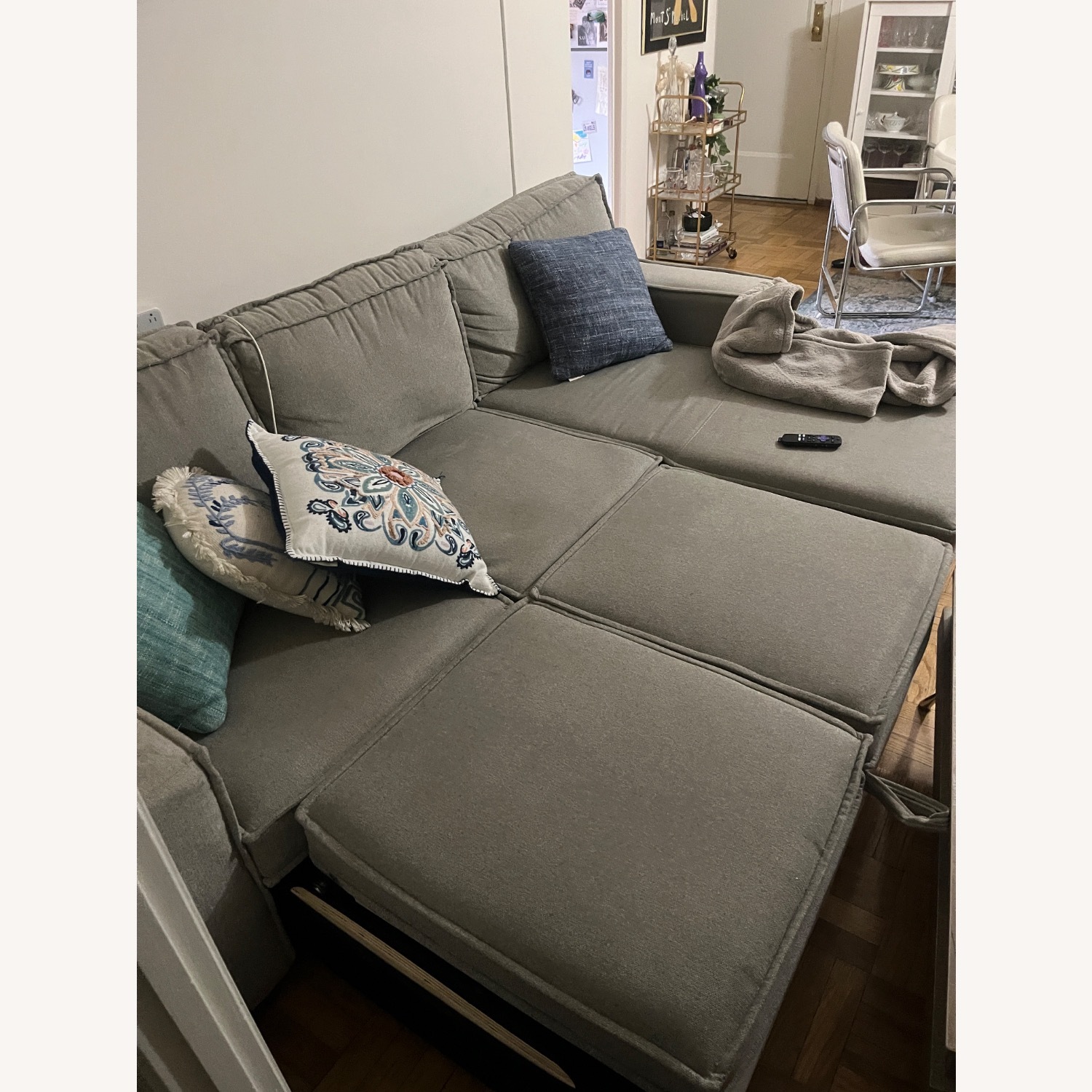 Bob's Discount Furniture Grey Couch That Converts to Bed - image-3
