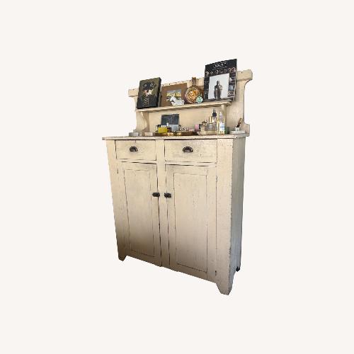 Used Vintage Butter Yellow Farmhouse Armoire  for sale on AptDeco