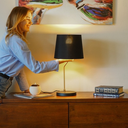 Used Solstice Table Lamp Black Outer Gold Inner for sale on AptDeco