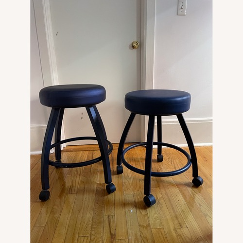 Used Retro Blue Rolling Stools for sale on AptDeco