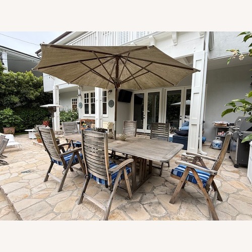 Used Teak Outdoor Dining Set for sale on AptDeco
