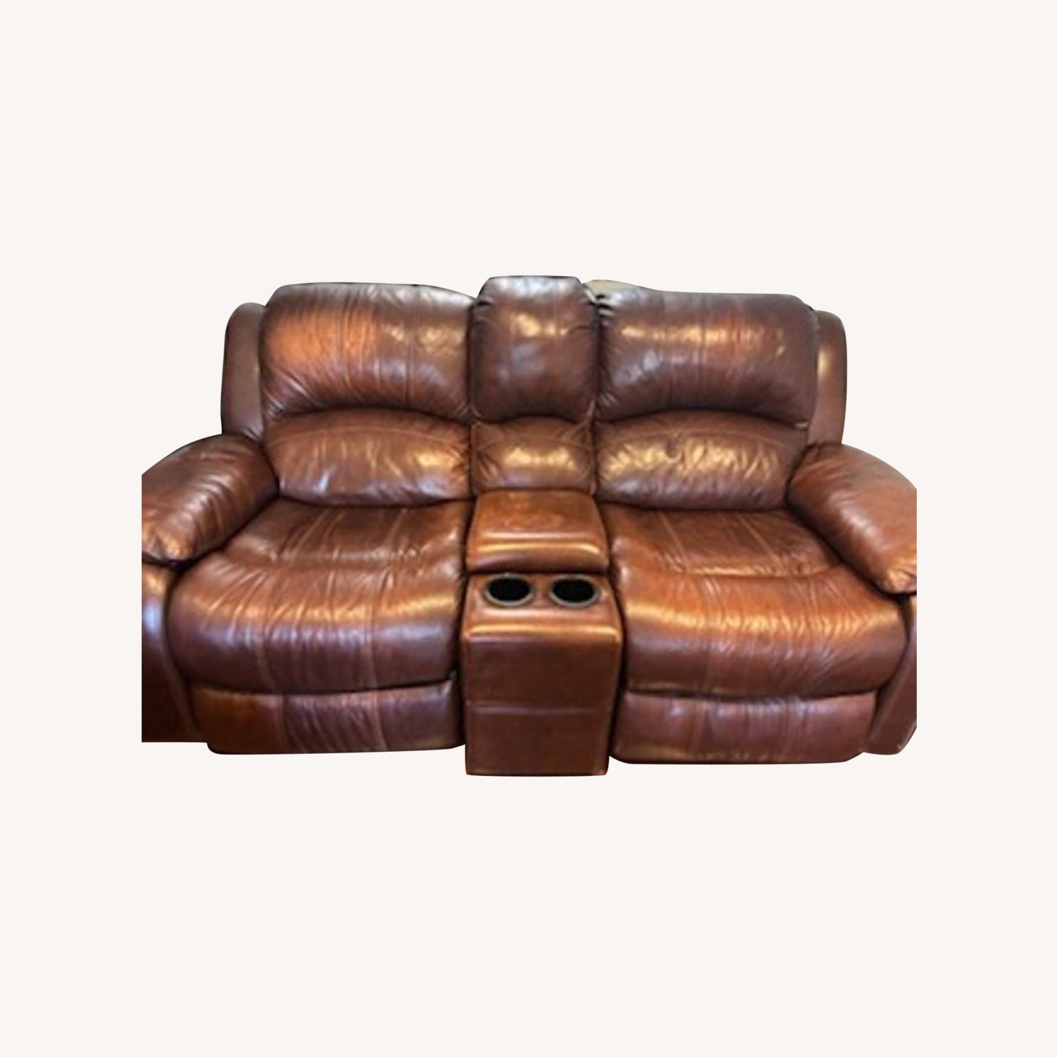 Raymour & Flanigan Reclining & Rocking Leather Sofa - image-0