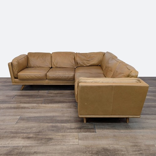 Used Article Tan Leather Timber Modern Corner Sectional for sale on AptDeco