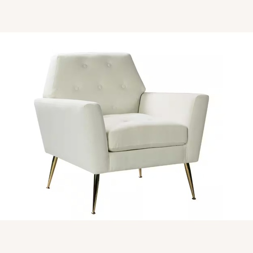 Used White Quilted Fabric Armchair  for sale on AptDeco