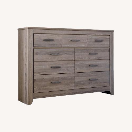 Used Design by Ashley® Zelen Warm Gray Dresser for sale on AptDeco