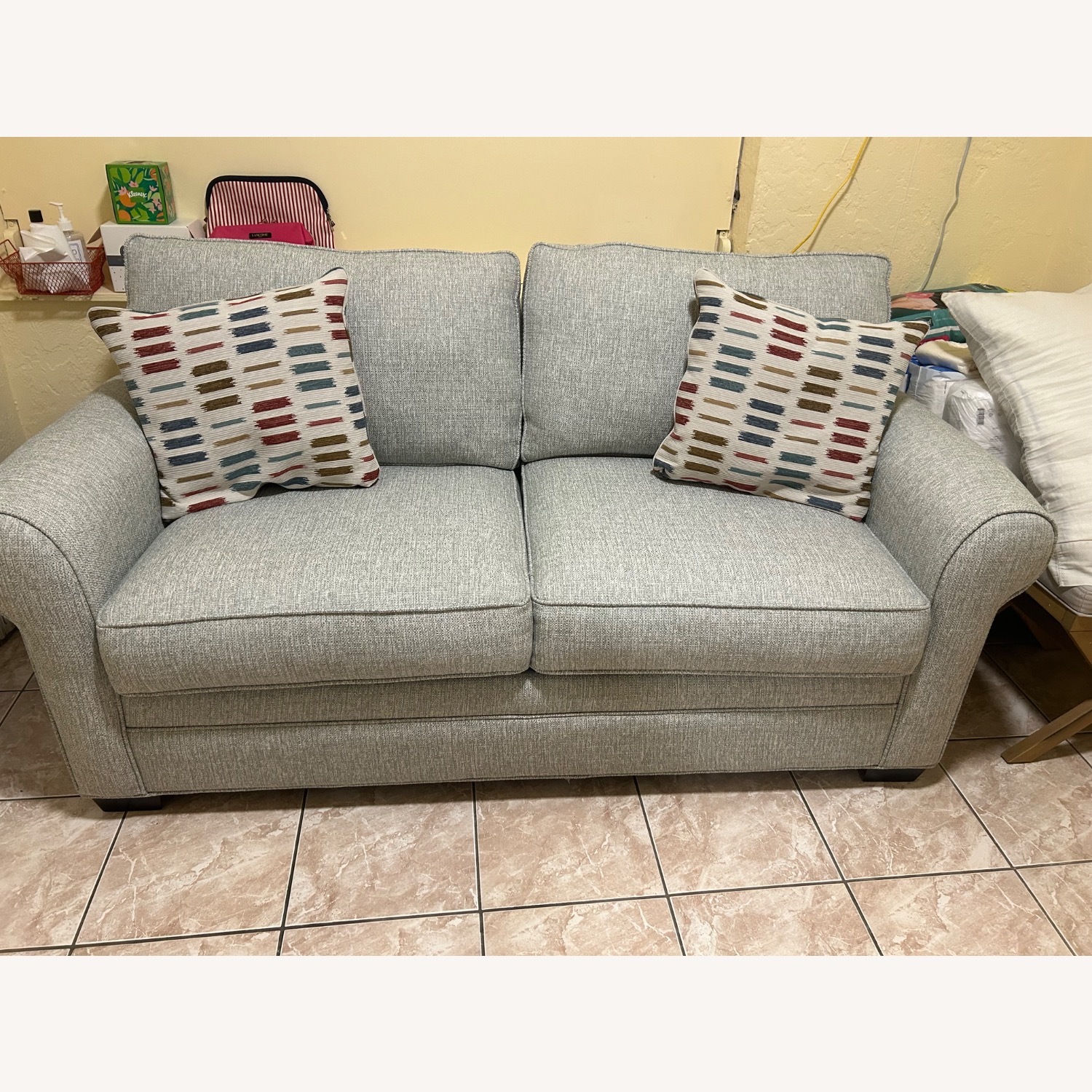 Rooms To Go Light Green/Gray Loveseat sleeper sofa - image-1