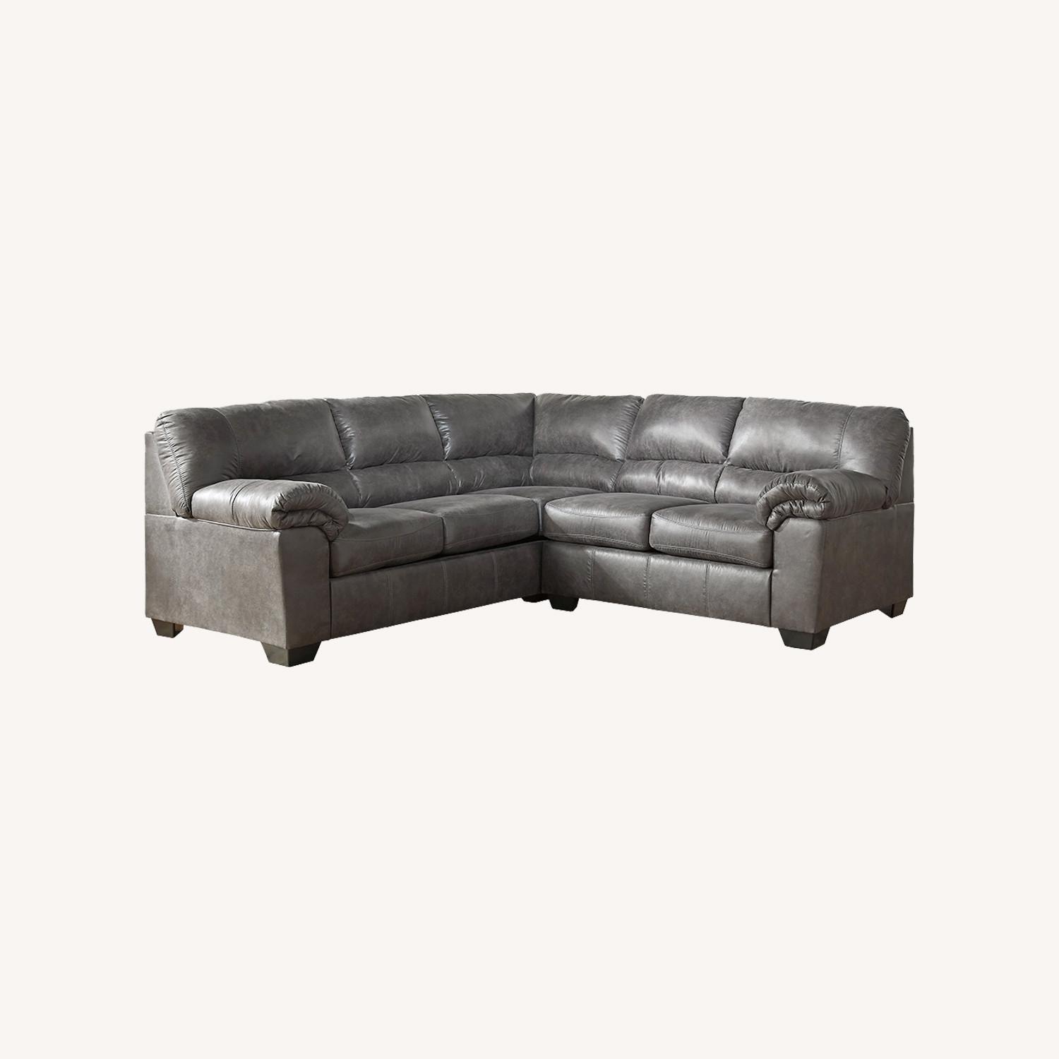 Ashley Furniture Grey Faux Leather 2 piece Sectional - image-0