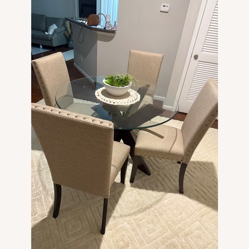 Used Ashley Furniture Dining Set with 4 Chairs for sale on AptDeco