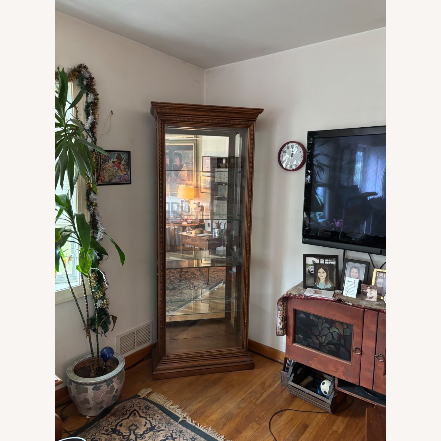 Howard Miller Wood and Glass Curio Cabinet - image-1