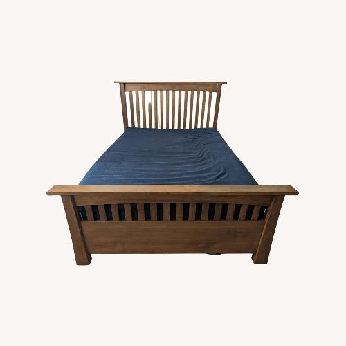 Used Solid Wood Amish Bed Frame with Lift Storage  for sale on AptDeco
