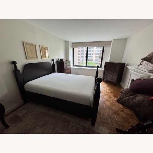 Used Pottery Barn Wood Queen Bed for sale on AptDeco