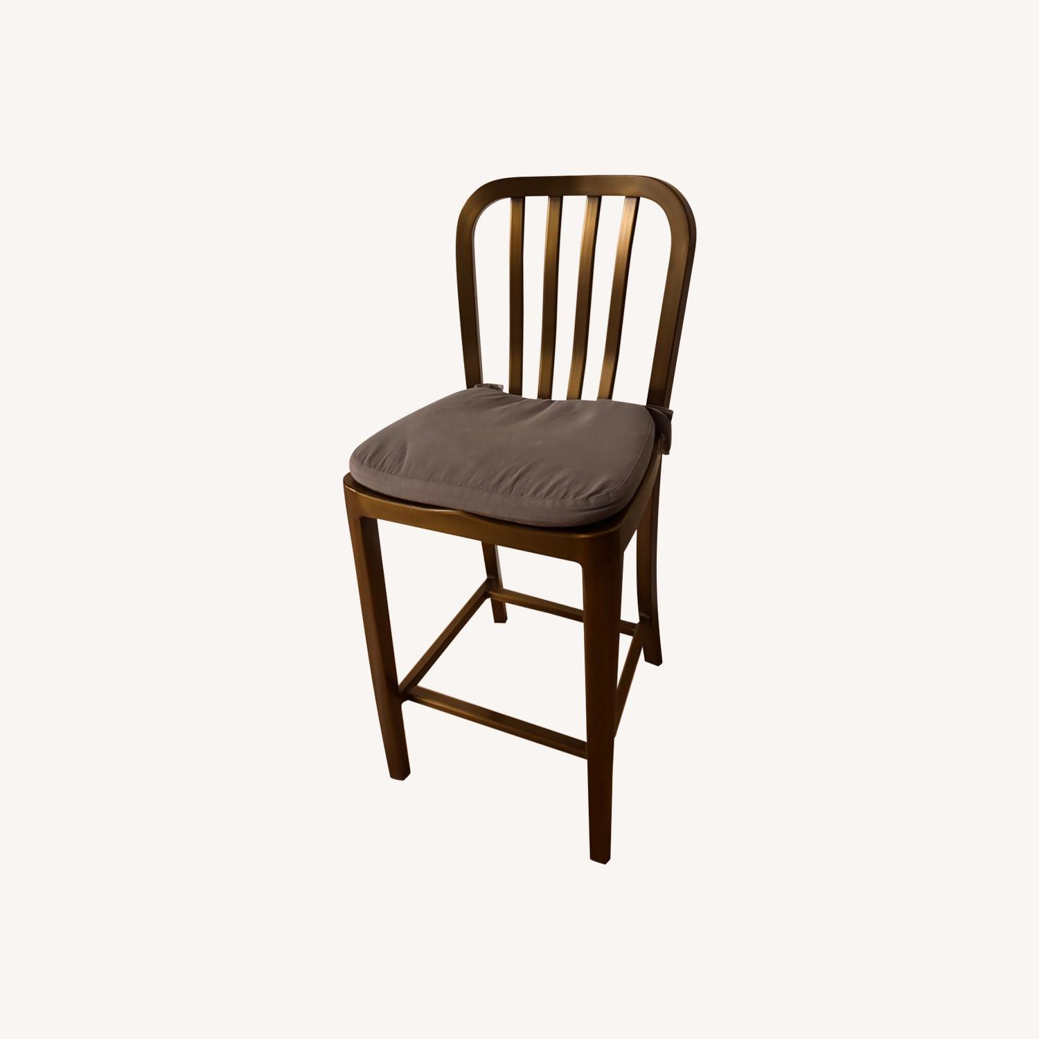 Crate & Barrel Delta Brass Counter Stool with Grey Cushion - image-0