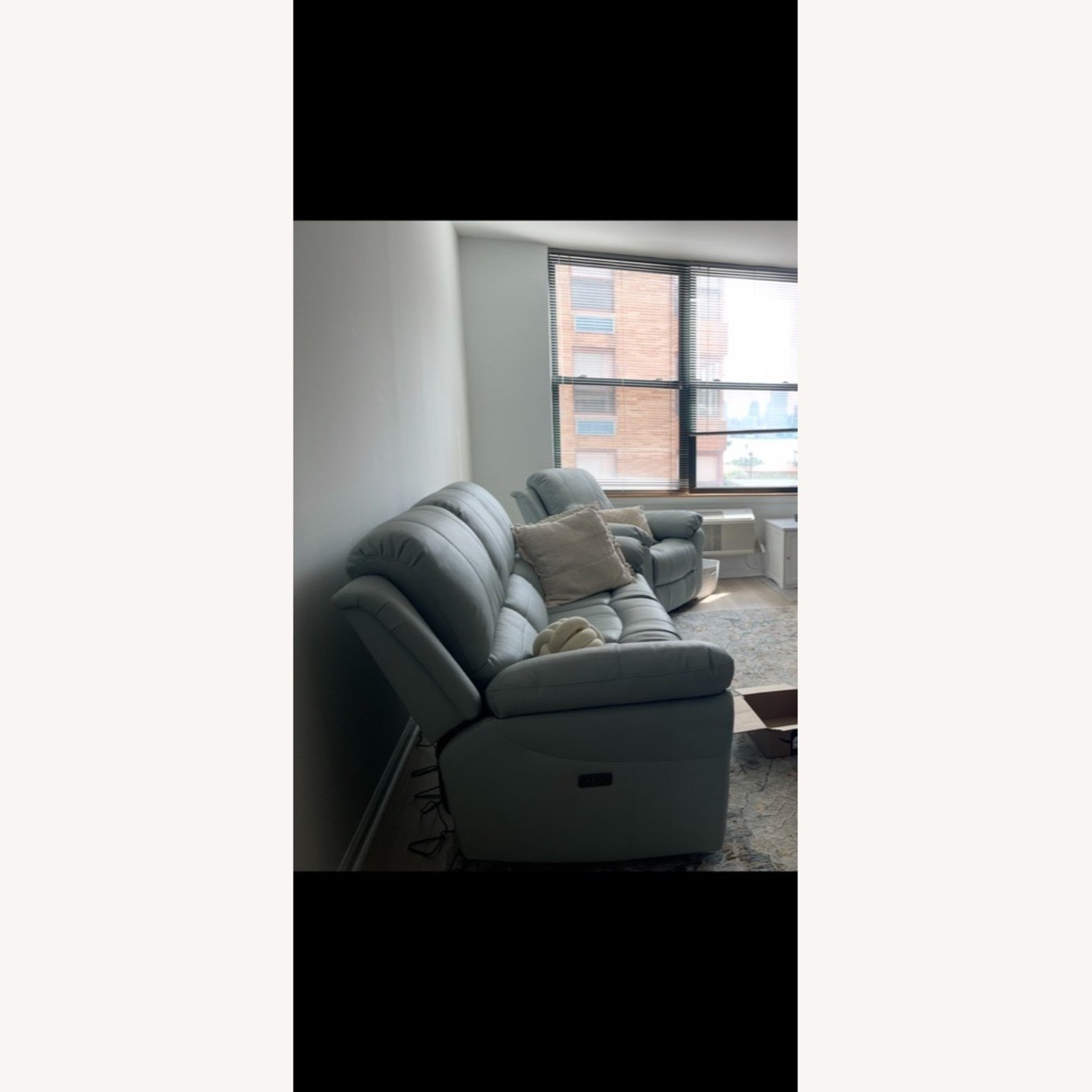 Bob's Discount Furniture Light Blue Leather Sofa  - image-1