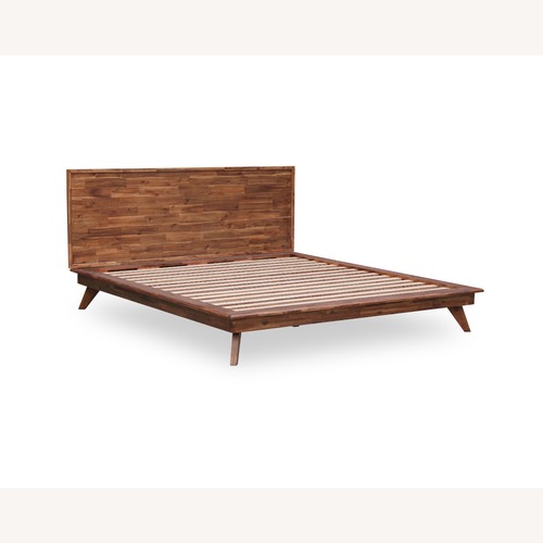 Used Queen Size Bed with Wood Paneled Headboard  for sale on AptDeco
