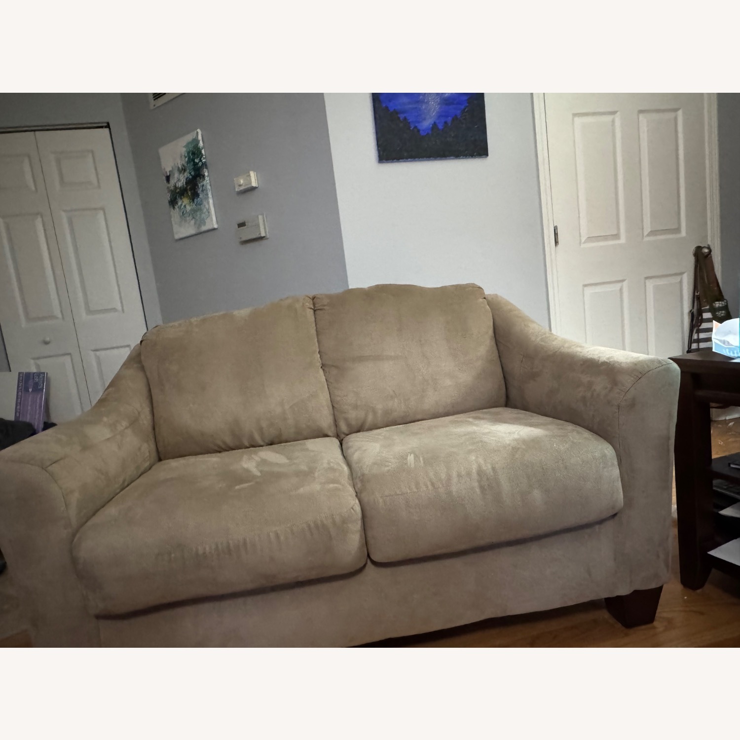 Ashley Furniture 56” Beige Loveseat - image-1