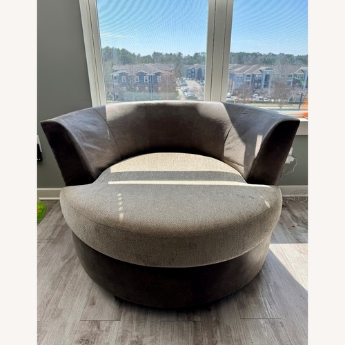 Used Rooms To Go Swivel Chair - Taupe for sale on AptDeco
