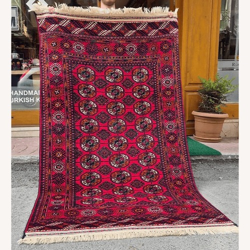 Used Hand-Knotted Bokhara Oriental Rug Medallion Style for sale on AptDeco