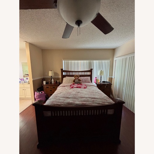 Used Brown Wood Queen Bed Frame  for sale on AptDeco