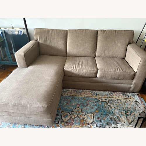 Used Stylish Sleeper Sofa with Reversible Chaise for sale on AptDeco