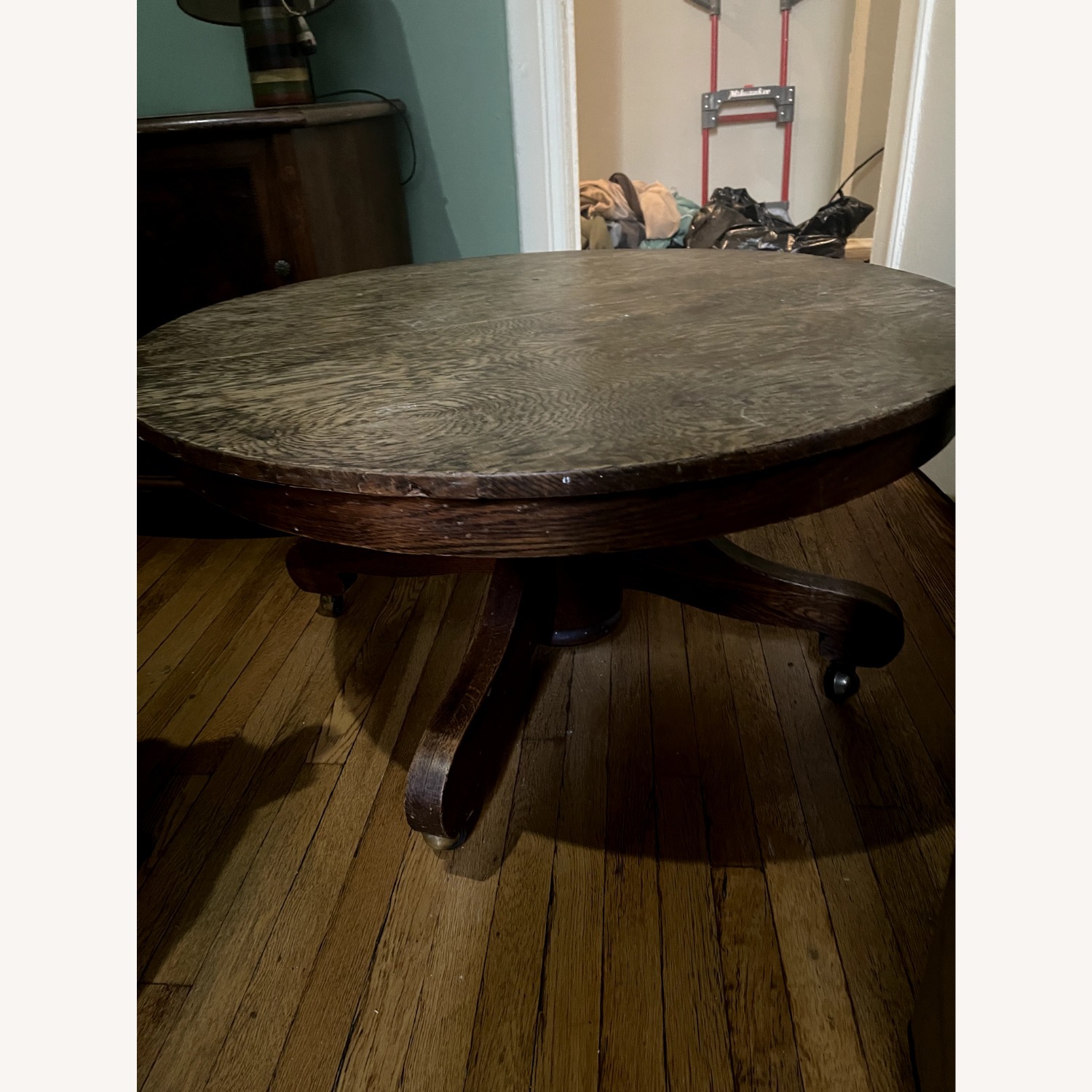 Antique Oak Veneer Round Coffee Table on Wheels - image-1