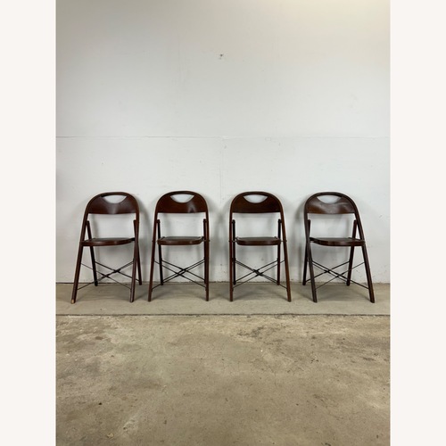 Used Set of 4 Antique Folding Chairs with Vinyl Seats for sale on AptDeco