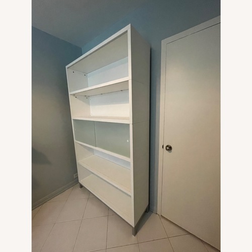 Used DWR Sapporo Shelving Unit - Brushed Aluminum Base for sale on AptDeco