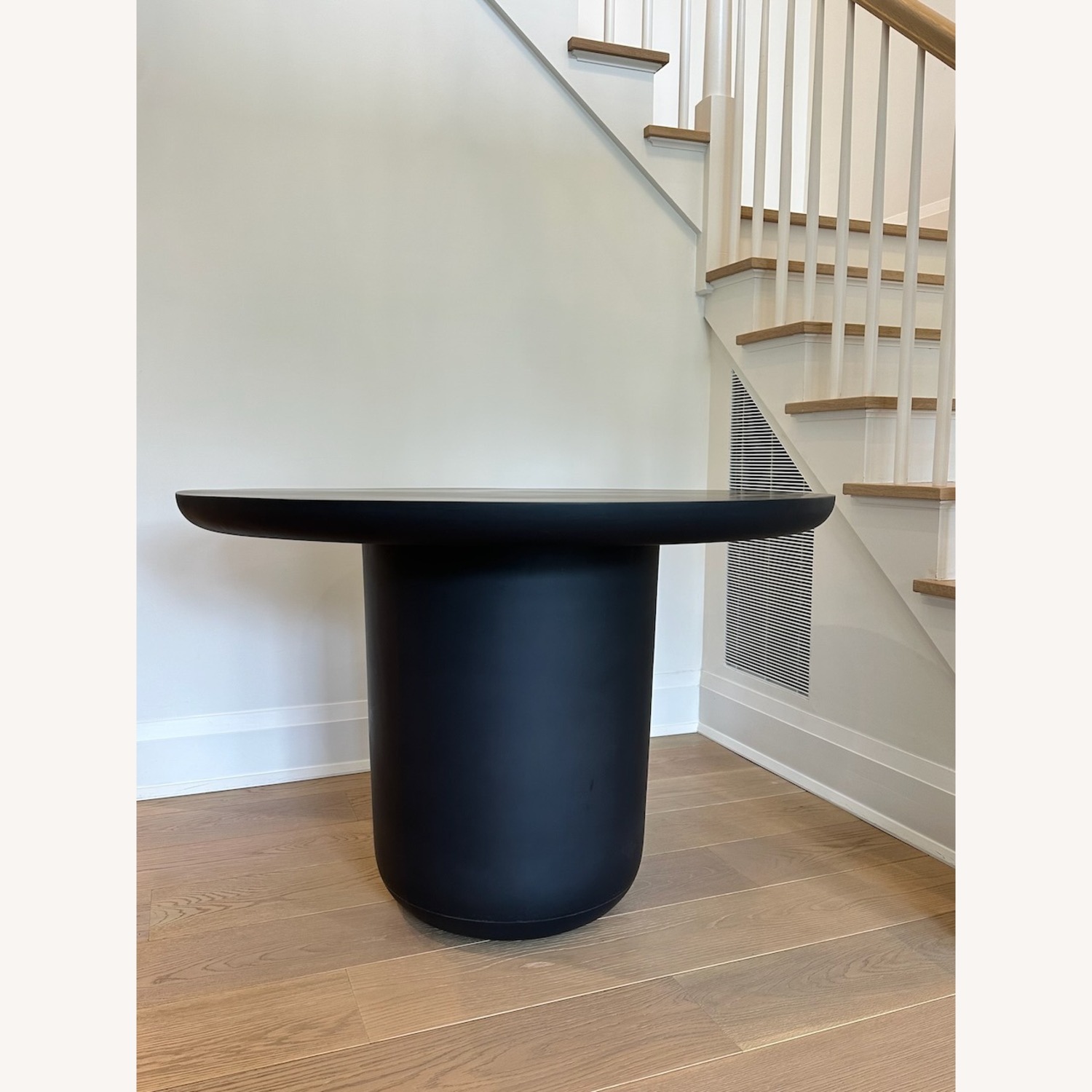 CB2 Lola 45" Round Black Concrete Dining Table - image-7