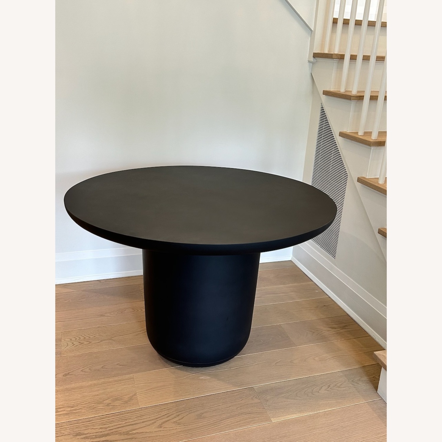 CB2 Lola 45" Round Black Concrete Dining Table - image-6
