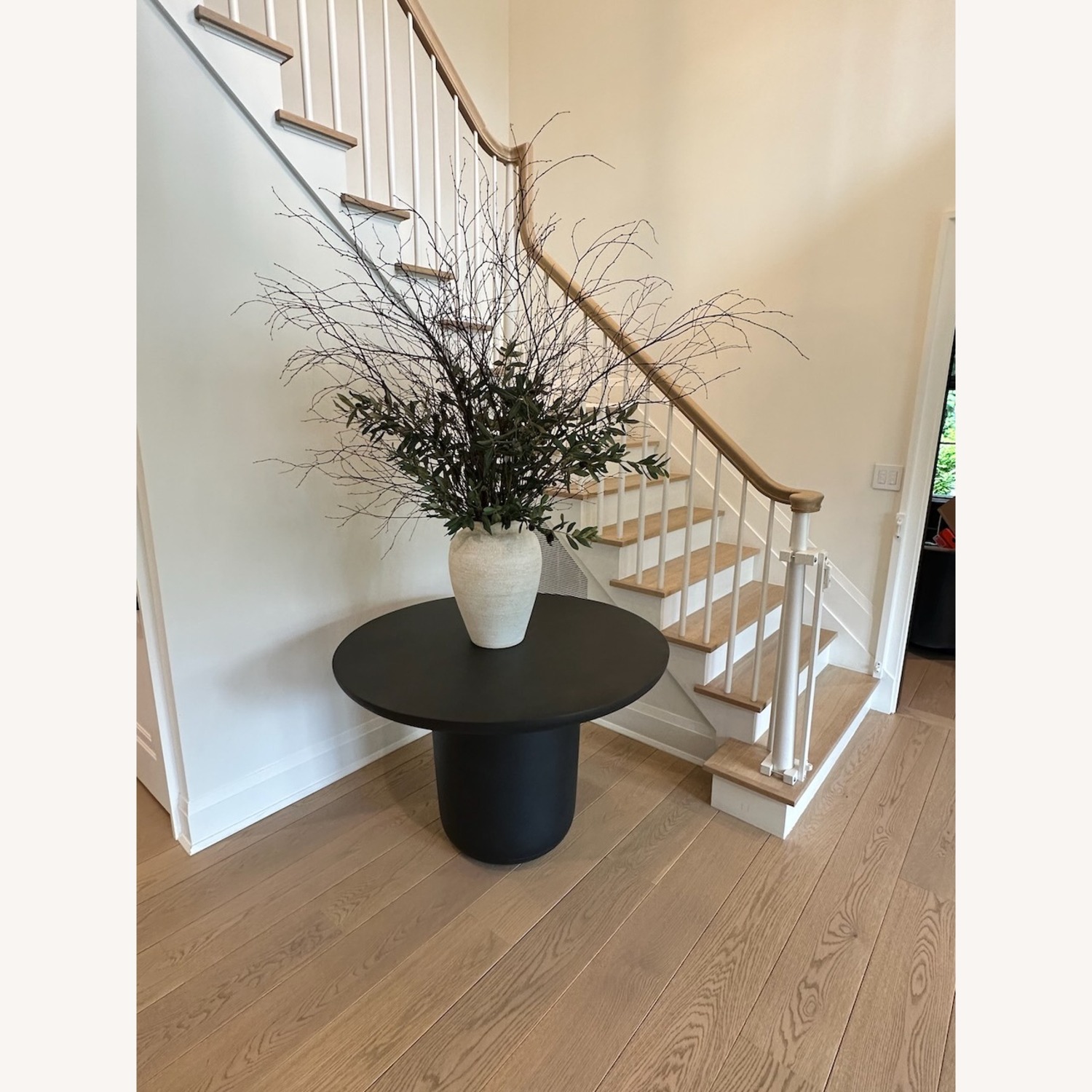 CB2 Lola 45" Round Black Concrete Dining Table - image-1