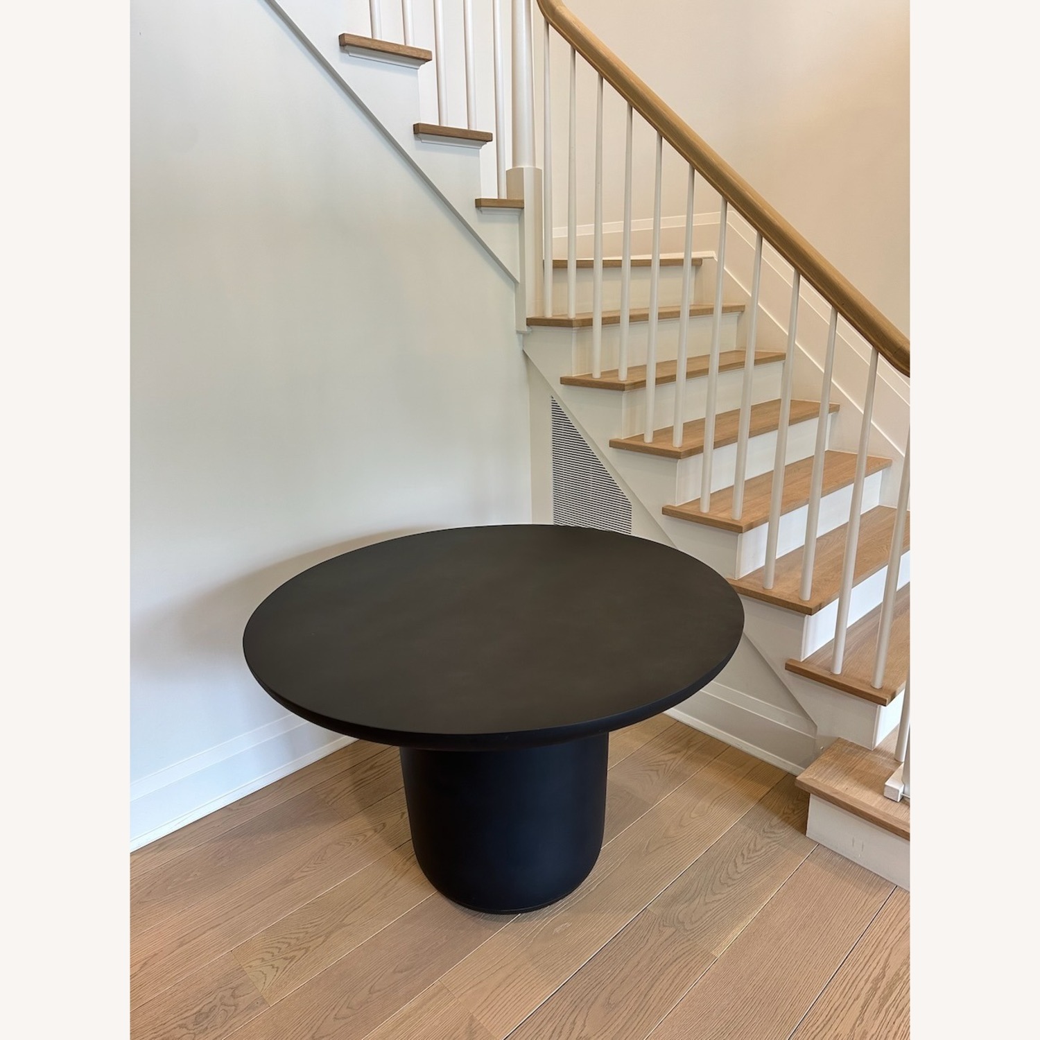 CB2 Lola 45" Round Black Concrete Dining Table - image-3