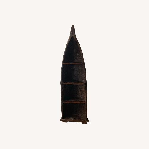 Used Hand Carved Balinese Canoe Bookshelf for sale on AptDeco