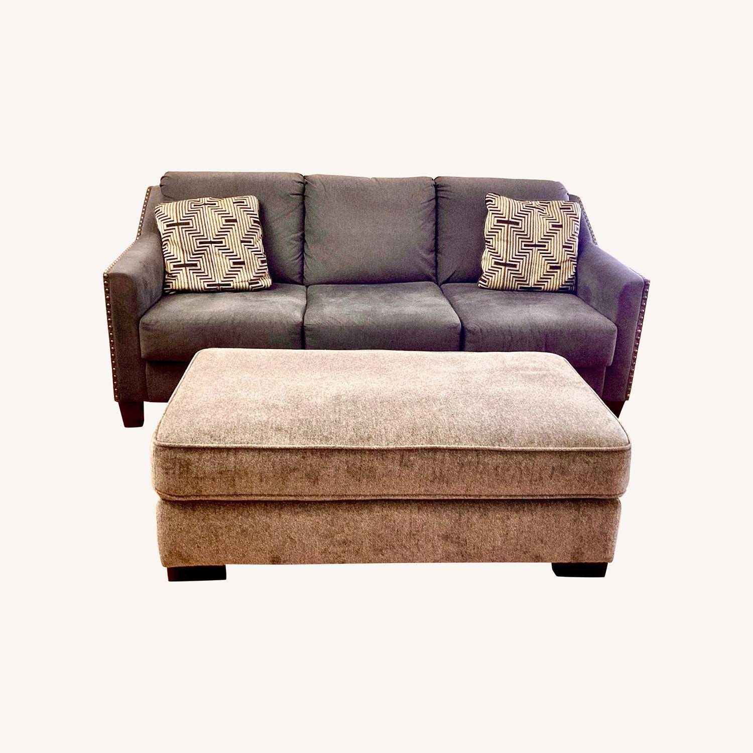 Ashley Furniture Gray Sofa and Ottoman - image-0