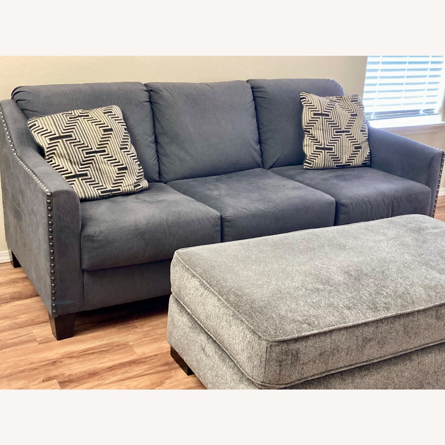 Ashley Furniture Gray Sofa and Ottoman - image-1