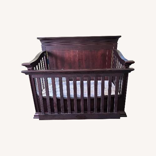 Used Elegant Convertible Baby Crib  for sale on AptDeco