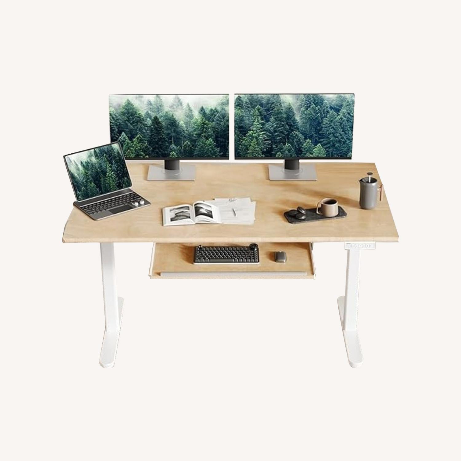 Amazon Electric Standing Desk Adjustable 55" x 24" - image-0