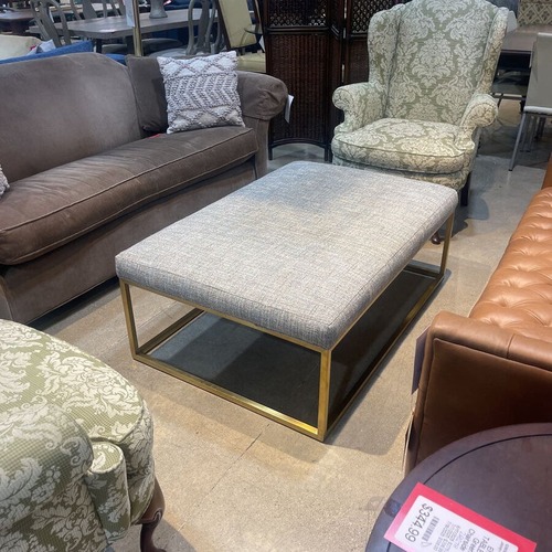 Used Contemporary Upholstered w Brass Legs Ottoman for sale on AptDeco