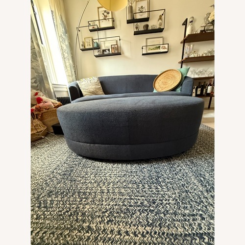 Used  Crate & Barrel Navy Infiniti Curve Ottoman for sale on AptDeco