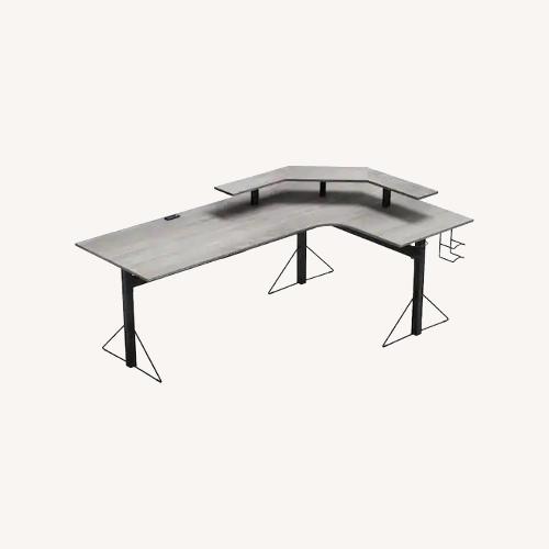 Used L-Shaped Gray/Black Desk with Shelf for sale on AptDeco