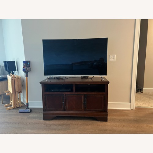 Used Wooden TV Stand with Storage for sale on AptDeco