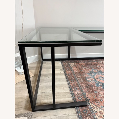 Used Pilsen Graphite L-Shaped Desk with Glass Top for sale on AptDeco