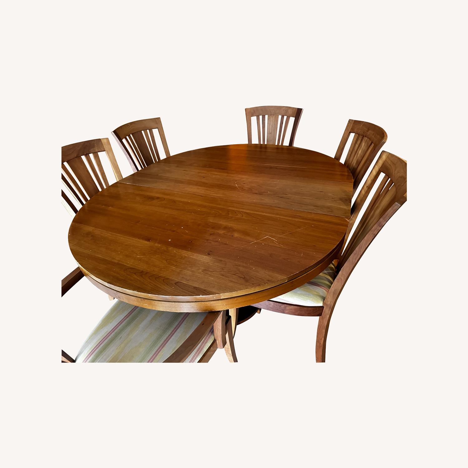 Extendable Round / Oval Dining Table and 8 Chairs - image-0