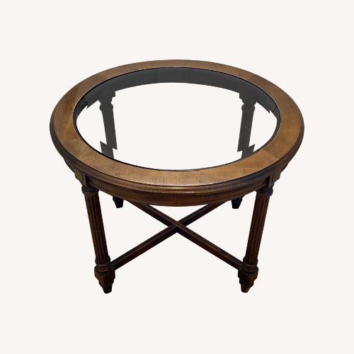 Used Glass Top Oval End Table  for sale on AptDeco