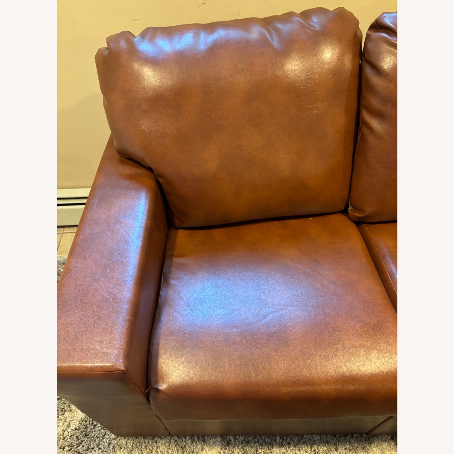 Faux Leather Sectional and Ottomans - image-3