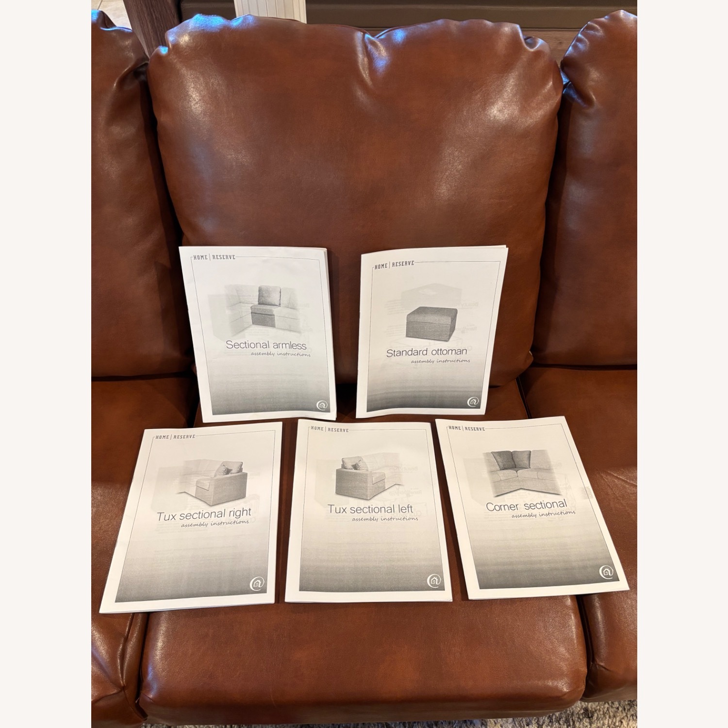 Faux Leather Sectional and Ottomans - image-6