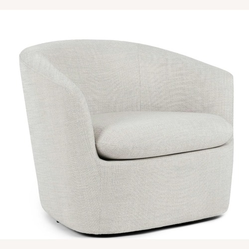 Used Article Turoy  Swivel Lounge Chair  for sale on AptDeco