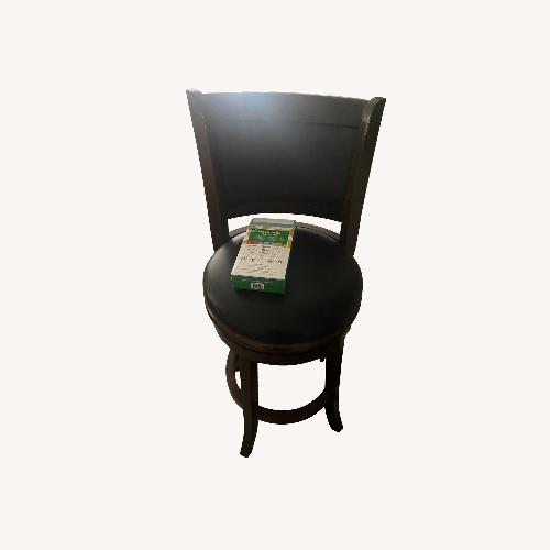 Used Dark Wood with Black Leather Bar Stools for sale on AptDeco