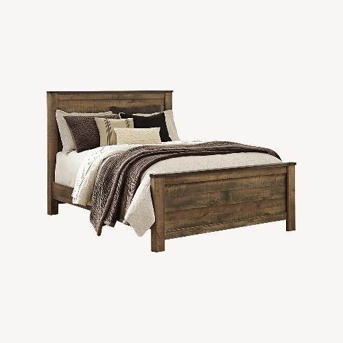 Used Brown Queen Panel Bed W 6 Drawer Dresser  for sale on AptDeco