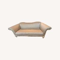 Silk Upholstered Sofa with Ornate Carved Wood Trim