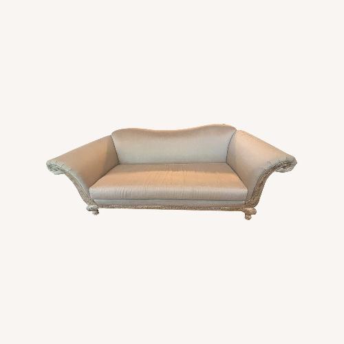 Used Silk Upholstered Sofa with Ornate Carved Wood Trim for sale on AptDeco